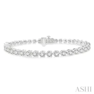 7 Ctw Tri-Prong Round Cut Diamond Bracelet in 14K White Gold