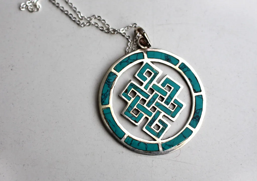 Turquoise Inlaid Endless Knot Sterling Silver Pendant