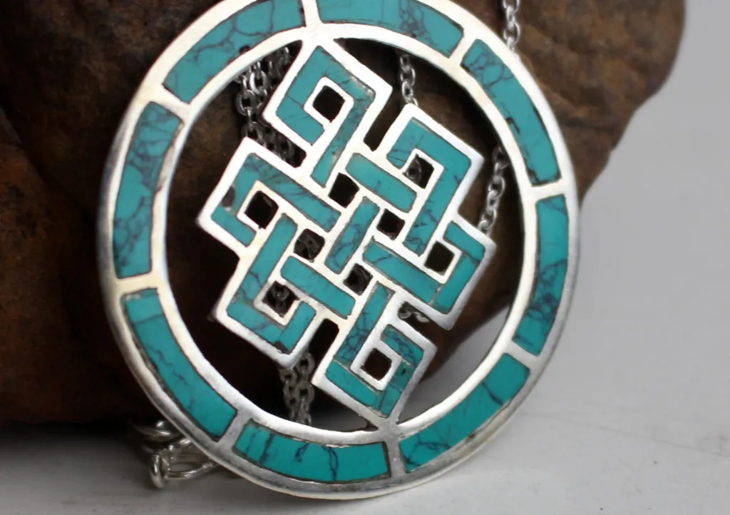 Turquoise Inlaid Endless Knot Sterling Silver Pendant